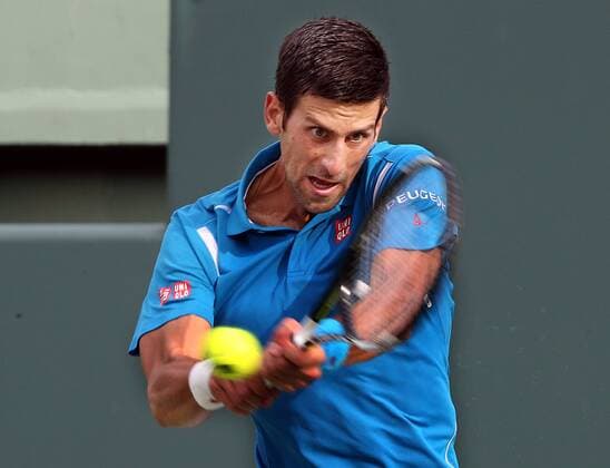 March 29, 2016 - Key Biscayne, FL, USA - Serbia s Novack Jokovic returns a shot against Austria s Dominic Thiem during the fourth round of the Miami Open at Crandon Park Tennis Center in Key Biscayne, Fla., on Tuesday, March 29, 2016. Jokovic advanced, 6-3, 6-4. Miami Open - ZUMAm67_