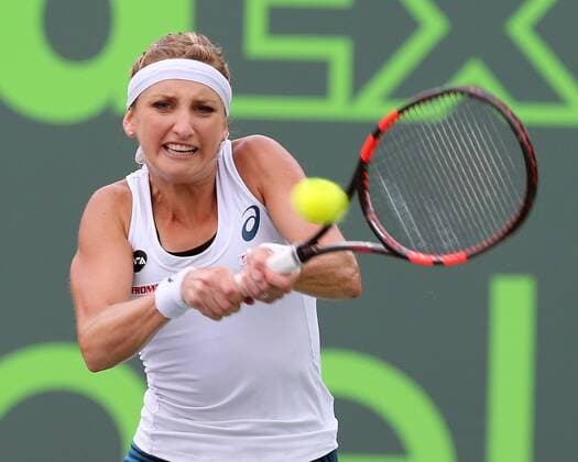 March 29, 2016 - Key Biscayne, FL, USA - Switzerland s Timea Bacsinszky returns a shot against Romania s Simona Halep during the quarterfinals of the Miami Open at Crandon Park Tennis Center in Key Biscayne, Fla., on Tuesday, March 29, 2016. Bacsinszky advanced, 4-6, 6-3, 6-2. Miami Open - ZUMAm67_