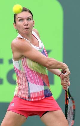 March 29, 2016 - Key Biscayne, FL, USA - Romania s Simona Halep returns a shot against Switzerland s Timea Bacsinszky during the quarterfinals of the Miami Open at Crandon Park Tennis Center in Key Biscayne, Fla., on Tuesday, March 29, 2016. Bacsinszky advanced, 4-6, 6-3, 6-2. Miami Open - ZUMAm67_