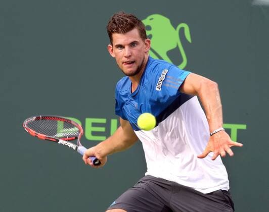 March 29, 2016 - Key Biscayne, FL, USA - Austria s Dominic Thiem returns a shot against Serbia s Novack Jokovicduring the fourth round of the Miami Open at Crandon Park Tennis Center in Key Biscayne, Fla., on Tuesday, March 29, 2016. Jokovic advanced, 6-3, 6-4. Miami Open - ZUMAm67_