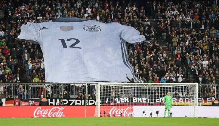 FUSSBALL INTERNATIONAL TESTSPIEL in Muenchen in der Allianz Arena Deutschland - Italien 29.03.2016 Adidas Fantrikot auf der Tribuene in der Allianzarena 