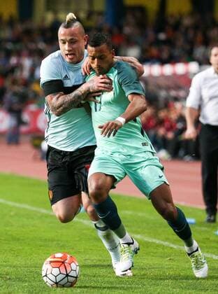 Belgium s Radja Nainggolan and Portugal s Nani fight for the ball during a soccer game between the Portugal national team Nationalteam and the Belgian Red Devils in Leiria, Portugal, Tuesday 29 March 2016, a preparation for the upcoming Euro2016 tournament. The match was moved due to safety concerns after the Brussels terrorists attacks. VIRGINIExLEFOUR  x04823594x