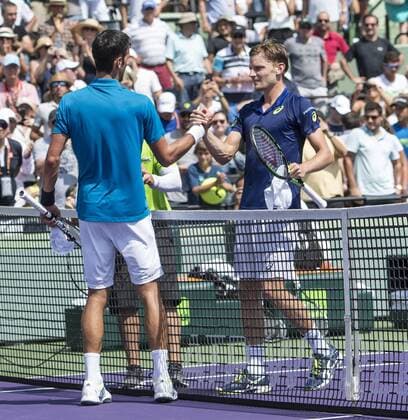 April 1 2016: Novak Djokovic (SRB), on left, shakes hands with David Goffin (BEL) at the Miami Open being played at Crandon Park Tennis Center in Miami, Key Biscayne, Florida. Ã‚Â© Tennis 2016:Miami Open APR 1 - ZUMAc04_
