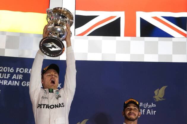 FORMULA 1 - Bahrain GP SAKHIR,BAHRAIN,03.APR.16 - MOTORSPORTS, FORMULA 1 - FIA World Championship WM Weltmeisterschaft Grand Prix of Bahrain, Bahrain International Circuit. Image shows the rejoicing of Nico Rosberg (GER Mercedes GP) and Lewis Hamilton (GBR Mercedes GP). Keywords: award ceremony, trophy. GEPAxpictures xFritzxMueller