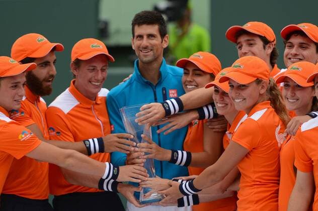 April 3, 2016 - Miami, Florida, United States - NOVAK DJOKOVIC poses with some of the ball kids after winning the Miami Open. Tennis 2016 - Miami Open - Day 14 - ZUMAl132