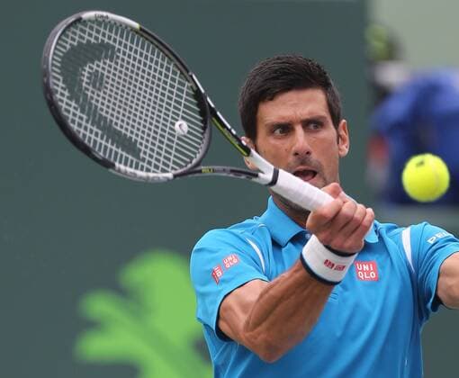 April 3, 2016 - Key Biscayne, FL, USA - Serbia s Novak Djokovic returns a shot against Japan s Kei Nishikori in the finals of the Miami Open on Sunday, April 3, 2016, at Cradon Park Tennis Center in Key Biscayne, Fla. Djokovic won, 6-3, 6-3. World No. 1 Novak Djokovic defeats Kei Nishikori for Miami Open title - ZUMAm67_