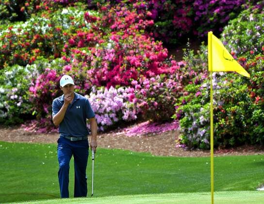 April 6, 2016 - Augusta, GA, USA - Jordan Spieth examines the 13th green during a practice round on Wednesday, April 6, 2016, at Augusta National Golf Club in Augusta, Ga. First round action of The Masters tournament begins on Thursday. Spieth is the defending champion. Masters practice - ZUMAm67_