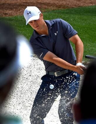 April 6, 2016 - Augusta, GA, USA - Jordan Spieth chips onto the 16th green from a sand trap during a practice round on Wednesday, April 6, 2016, at Augusta National Golf Club in Augusta, Ga. First round action of The Masters tournament begins on Thursday. Spieth is the defending champion. Masters practice - ZUMAm67_