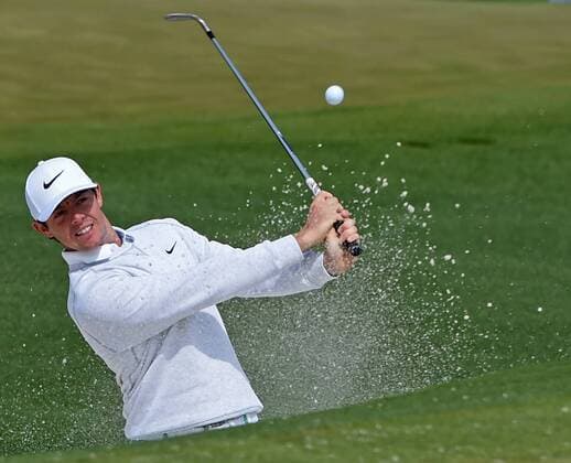 April 6, 2016 - Augusta, GA, USA - Rory McIlroy hits a ball from a sand trap during practice on Wednesday, April 6, 2016, at Augusta National Golf Club in Augusta, Ga. First round action of The Masters tournament begins on Thursday. Masters practice - ZUMAm67_