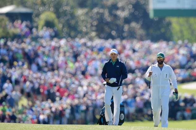 Caddie Michael Greller and Jordan Spieth walk to the 3rd green in the first round of the 2016 Masters Tournament at Augusta National in Augusta, Georgia on April 7, 2016.  MAS20160407129 KEVINxDIETSCH