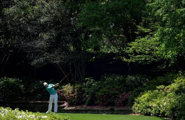 Jordan Spieth hits his tee shot on the 13th hole in the first round of the 2016 Masters Tournament at Augusta National in Augusta, Georgia on April 7, 2016.  MAS20160407137 KEVINxDIETSCH