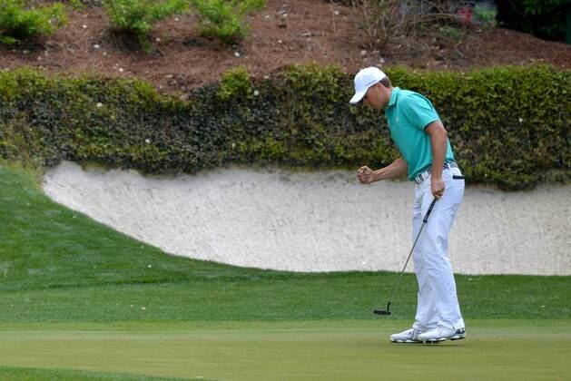 Jordan Spieth reacts after making a par putt on the 12th hole in the first round of the 2016 Masters Tournament at Augusta National in Augusta, Georgia on April 7, 2016.  MAS20160407138 KEVINxDIETSCH