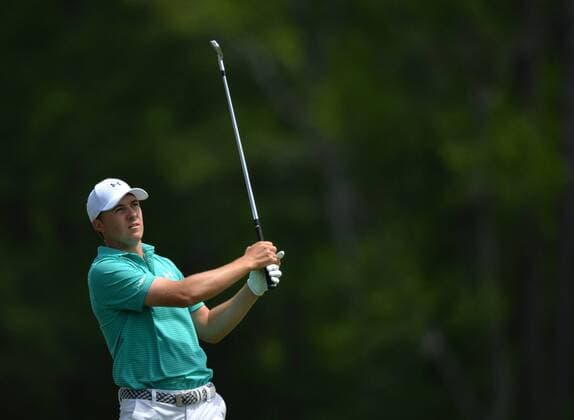 Jordan Spieth hits his tee shot on the 12th hole in the first round of the 2016 Masters Tournament at Augusta National in Augusta, Georgia on April 7, 2016.  MAS20160407142 KEVINxDIETSCH