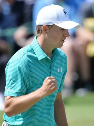 Jordan Spieth reacts after making a putt for birdie on the 18th hole in the first round of the 2016 Masters Tournament at Augusta National in Augusta, Georgia on April 7, 2016.  MAS20160407170 KEVINxDIETSCH