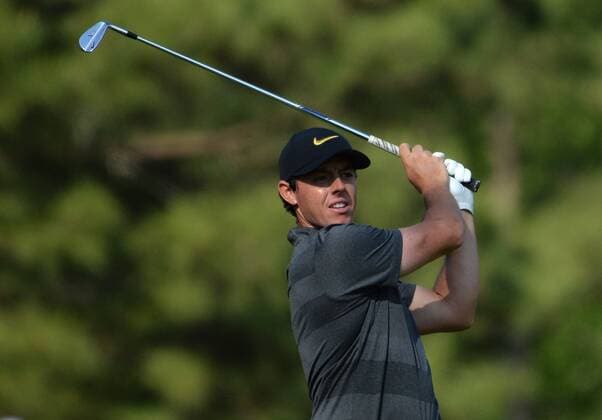 Rory McIlroy of Northern Ireland hits off of the 12th tee in the first round of the 2016 Masters Tournament at Augusta National in Augusta, Georgia on April 7, 2016.  AUG20160407305 KEVINxDIETSCH