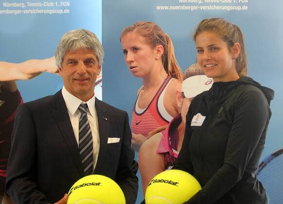 08.04.2016 - Tennis - Nürnberger Versicherungs Cup 2016 - WTA Tennis Damen Women - Damen - Pressekonferenz - JüRa - Dr. Armin Zitzmann (Vorstandsvorsitzender Nürnberger Versicherungsgruppe) und Julia Görges (Tennisprofi)