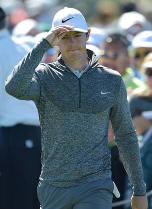 Rory McIlroy of North Ireland tips his cap as he walk out to the first tee box in the second round of the 2016 Masters Tournament at Augusta National in Augusta, Georgia on April 8, 2016.  MAS20160408106 KEVINxDIETSCH