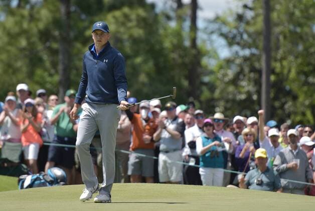 Jordan Spieth and fans react after Spieth makes a putt for birdie on the first hole in the second round of the 2016 Masters Tournament at Augusta National in Augusta, Georgia on April 8, 2016.  MAS20160408113 KEVINxDIETSCH