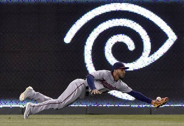 April 8, 2016 - Kansas City, MO, USA - Minnesota Twins left fielder Eddie Rosario misses an RBI triple by the Kansas City Royals Salvador Perez in the eighth inning on Friday, April 8, 2016, at Kauffman Stadium in Kansas City, Mo. Minnesota at Kansas City - ZUMAm67_