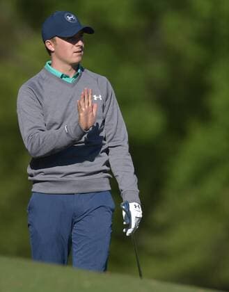 Jordan Spieth reacts after he hits his tee shot on the 12th hole in the third round of the 2016 Masters Tournament at Augusta National in Augusta, Georgia on April 9, 2016.  MAS20160409137 KEVINxDIETSCH