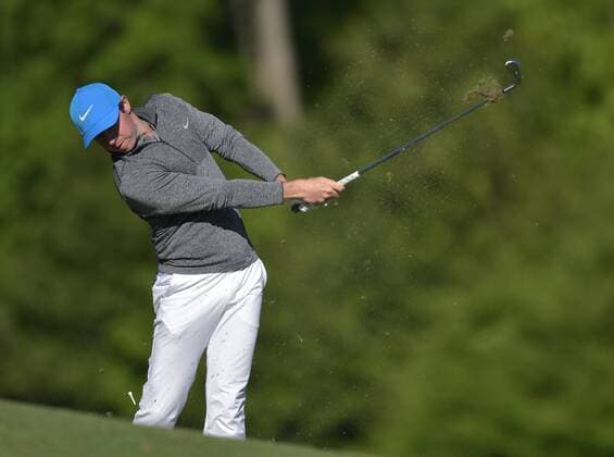 Rory McIlroy of Northern Ireland hits his tee shot on the 12th hole in the third round of the 2016 Masters Tournament at Augusta National in Augusta, Georgia on April 9, 2016.  MAS20160409138 KEVINxDIETSCH