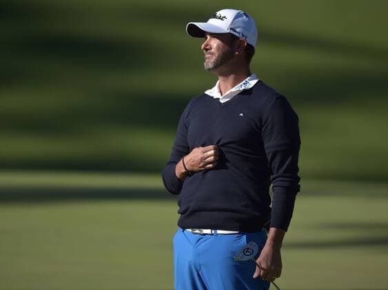 Scott Piercy reacts after missing a putt on the 10th green in the third round of the 2016 Masters Tournament at Augusta National in Augusta, Georgia on April 9, 2016.  MAS20160409151 KEVINxDIETSCH