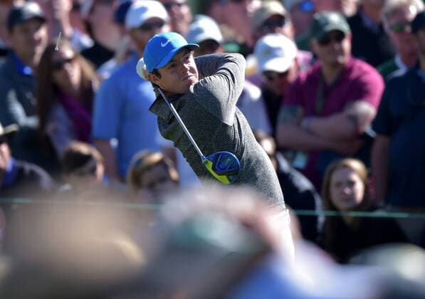 Rory McIlroy of Northern Ireland hits a tee shot on the 8th hole in the third round of the 2016 Masters Tournament at Augusta National in Augusta, Georgia on April 9, 2016.  MAS20160409159 KEVINxDIETSCH