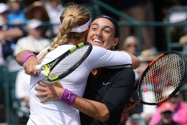 April 10, 2016 - Charleston, South Carolina, United States - CAROLINE GARCIA and KRISTINA MLADENOVIC of France celebrate winning the doubles title at the Volvo Car Open Tennis 2016 - Volvo Car Open - Day 7 - ZUMAl132