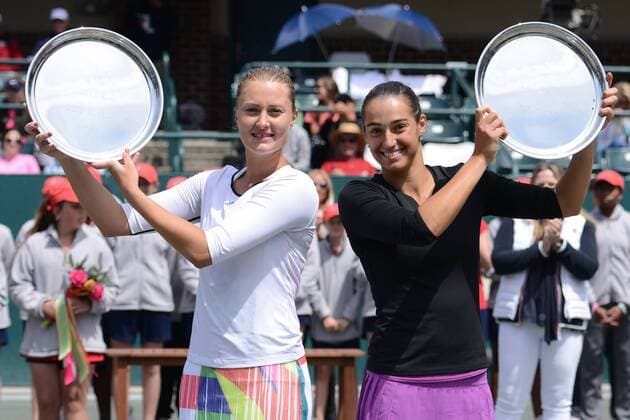 April 10, 2016 - Charleston, South Carolina, United States - KRISTINA MLADENOVIC (left) and CAROLINE GARCIA of France pose with their trophies after winning the doubles title at the Volvo Car Open Tennis 2016 - Volvo Car Open - Day 7 - ZUMAl132
