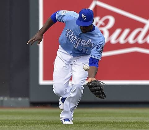 Baseball, MLB, Kansas City Royals - Minnesota Twins April 10, 2016 - Kansas City, MO, USA - A line drive by Minnesota Twins Eduardo Nunez that scored Joe Mauer bounces off the glove of Kansas City Royals center fielder Lorenzo Cain, allowing Miguel Sano to advance to third during the sixth inning on Sunday, April 10, 2016, at Kauffman Stadium in Kansas City, Mo. Minnesota Twins at Kansas City Royals - ZUMAm67_