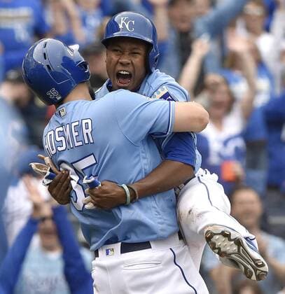 Baseball, MLB, Kansas City Royals - Minnesota Twins April 10, 2016 - Kansas City, MO, USA - Kansas City Royals Terrance Gore leaps into the arms of Eric Hosmer after scoring on a wild pitch from Minnesota Twins relief pitcher Trevor May during the tenth inning on Sunday, April 10, 2016, at Kauffman Stadium in Kansas City, Mo. Minnesota Twins at Kansas City Royals - ZUMAm67_