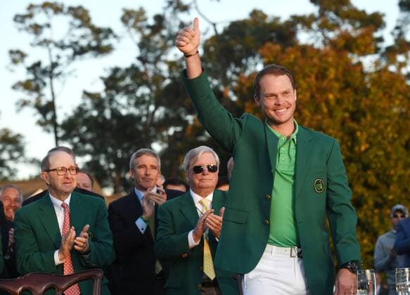 Danny Willett of England gives a thumbs up wearing his Green Jacket after winning the 2016 Masters Tournament with a score of 5 under par at Augusta National in Augusta, Georgia on April 10, 2016. Danny Willett won in his second Masters and he became the first player from England to win the green jacket since Nick Faldo in 1996.  MAS20160410160 KEVINxDIETSCH