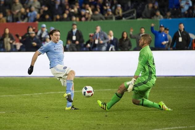 April 6, 2016 - Bronz, New York, U.S - Chicago Fire goalkeeper MATT LAMPSON (28) stops attempt on gaol by New York City FC midfielder THOMAS MCNAMARA Soccer 2016 - NYCFC vs Chicago Fire 0-0 - ZUMAs192