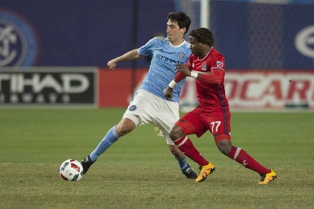 April 6, 2016 - Bronz, New York, U.S - New York City FC defender ANDONI IRAOLA (51) and Chicago Fire forward KENNEDY IGBOANANIKE (77) fight for the ball at Yankee Stadium Soccer 2016 - NYCFC vs Chicago Fire 0-0 - ZUMAs192