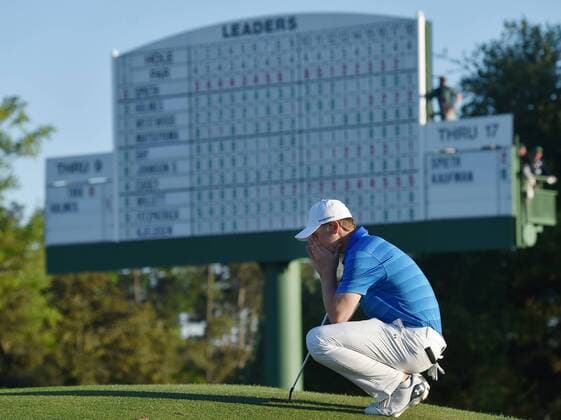 April 10, 2016 - Augusta, GA, USA - Jordan Spieth gathers his thoughts on the 18th green in front of the leaderboard before finishing his final round of the 80th Masters on Sunday, April 10, 2016, at Augusta National Golf Club in Augusta, Ga. Masters final round - ZUMAm67_