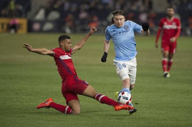 April 6, 2016 - Bronz, New York, U.S - New York City FC midfielder THOMAS MCNAMARA (15) dribbles the ball past Chicago Fire defender JOHAN KAPPELHOF Soccer 2016 - NYCFC vs Chicago Fire 0-0 - ZUMAs192