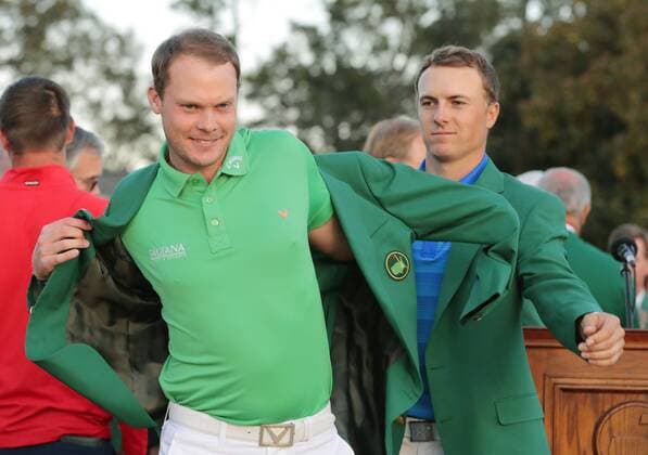 Willett wins Masters after shocking stumble by Spieth Danny Willett of England (L) is helped by Jordan Spieth of the United States into his green jacket after coming from behind to win the Masters Tournament by three strokes at Augusta National Golf Club in Georgia on April 10, 2016. Spieth, the 2015 champion, could only manage a 1-over 73 in the final round to settle for a share of second place. 