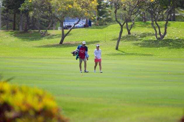 April 12, 2016 - Danielle Kang walks with her caddie during the Pro Am day of the Lotte Championship presented by Hershey at Ko Olina Golf Club in Kapolei, HI LPGA Golf Damen Golf 2016: Lotte Championship APR 12 - ZUMAc04_