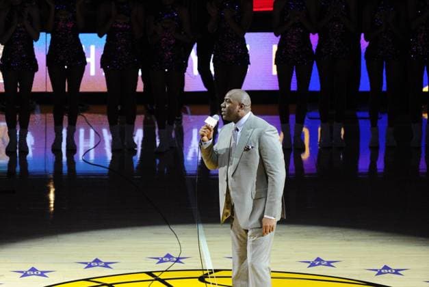 Magic Johnson introduces Los Angeles Lakers Kobe Bryant in his last game against the Utah Jazz at Staples Center in Los Angeles on April 13, 2016.  LAP20160413909 LORIxSHEPLER