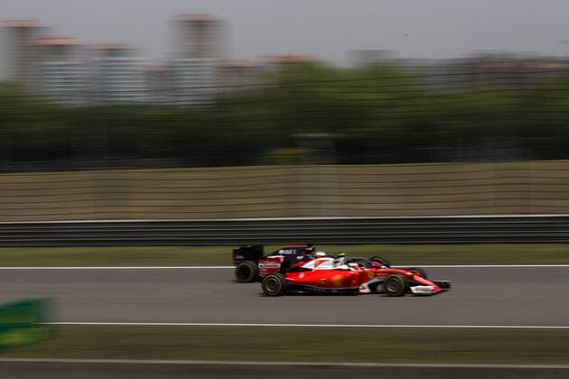 Chinese Grand Prix, Shanghai 14 - 17 April 2016 15.04.2016 - Free Practice 1, Fernando Alonso (ESP) McLaren Honda MP4-31 and Kimi Raikkonen (FIN) Scuderia Ferrari SF16-H 