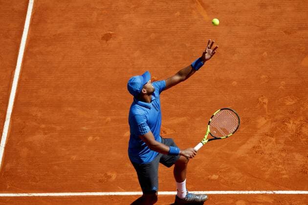 15.04.2016: Rolex Monte Carlo Masters Tennis: Jo-Wilfroed Tsonga in action against Roger Federer in the last 8 at the Monte-Carlo Country Club. 15.04.2016: Rolex Monte Carlo Masters Tennis 