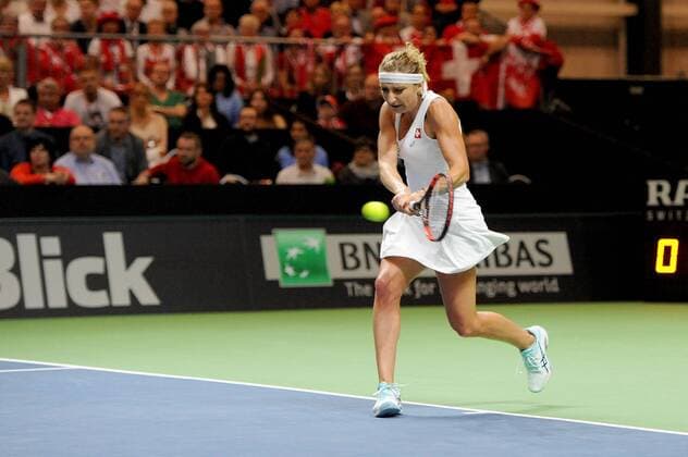 16.04.2016. Messe Luzern, Lucerne, Switzerland. Fed Cup Semi Final. Switzerland Versus Czech Republic. Timea Bacsinszky in action in the match with Barbora Strycova of the Czech Republic xDavidxEmmx  ActionPlus11728466