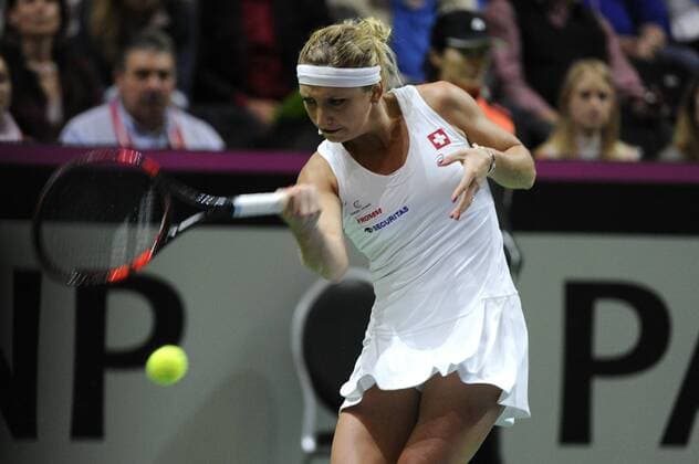 16.04.2016. Messe Luzern, Lucerne, Switzerland. Fed Cup Semi Final. Switzerland Versus Czech Republic. Timea Bacsinszky in action in the match with Barbora Strycova of the Czech Republic xDavidxEmmx  ActionPlus11728471