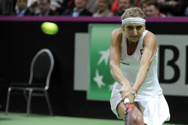 16.04.2016. Messe Luzern, Lucerne, Switzerland. Fed Cup Semi Final. Switzerland Versus Czech Republic. Timea Bacsinszky in action in the match with Barbora Strycova of the Czech Republic xDavidxEmmx  ActionPlus11728484
