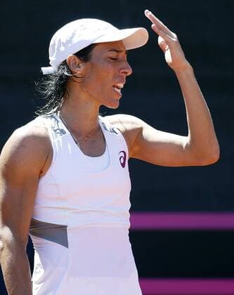 Italian Francesca Schiavone regrets losing a point against Spanish Garbine Muguruza during their game as part of Federation Cup s World Group play-off at Lleida tennis club, northeastern Spain, 16 April 2016. Muguruza won 7-6 (4) and 6-0. Spain vs. Italy !ACHTUNG: NUR REDAKTIONELLE NUTZUNG!  20160416-635964209323672183