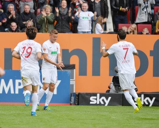Augsburg Jubel zum 1:0 mit v.l. Ja-Cheol Koo 19 (FC Augsburg), Torschuetze Alfred Finnbogason 27 (FC Augsburg) und Halil Altintop 7 (FC Augsburg) beim Spiel FC Augsburg gegen den VfB Stuttgart in der 1. Fussball Bundesliga der Herren am 30. Spieltag in der Saison 2015 2016 am 16.04.2016 Copyright: hiermx xEibner-Pressefoto EP_thmr