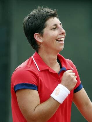 Federation Cup Spanish team s member Carla Suarez celebrates her victory against Italian Roberta Vinci during their game as part of Federation Cup s World Group play-off at Lleida tennis club, northeastern Spain, 16 April 2016. Carla won 6-1 and 6-1. Spain vs. Italy !ACHTUNG: NUR REDAKTIONELLE NUTZUNG!  20160416-635964231394096639