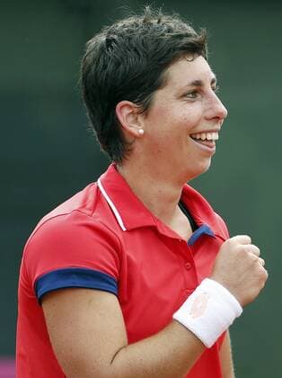 Federation Cup Spanish team s member Carla Suarez celebrates her victory against Italian Roberta Vinci during their game as part of Federation Cup s World Group play-off at Lleida tennis club, northeastern Spain, 16 April 2016. Carla won 6-1 and 6-1. Spain vs. Italy !ACHTUNG: NUR REDAKTIONELLE NUTZUNG!  20160416-635964231404236574