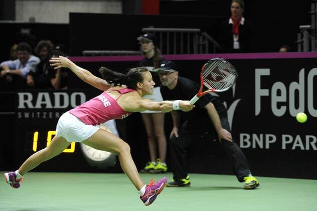 16.04.2016. Messe Luzern, Lucerne, Switzerland. Fed Cup Semi Final. Switzerland Versus Czech Republic. Viktorija Golubic in action in the match between Viktorija Golubic of Switzerland and Karolina Pliskova of the Czech Republic xDavidxEmmx  ActionPlus11728674