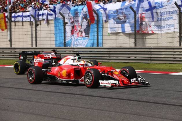 Chinese Grand Prix, Shanghai 14 - 17 April 2016 17.04.2016 - Race, Sebastian Vettel (GER) Scuderia Ferrari SF16-H and Fernando Alonso (ESP) McLaren Honda MP4-31 